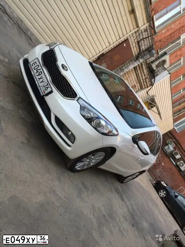 Фото автомобиля KIA CERATO, 2014 — госномер К676НВ30. Цвет: Белый