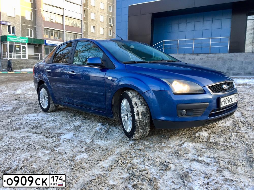 Фото автомобиля FORD FOCUS, 2006 — госномер О909СК174. Цвет: СИНИЙ