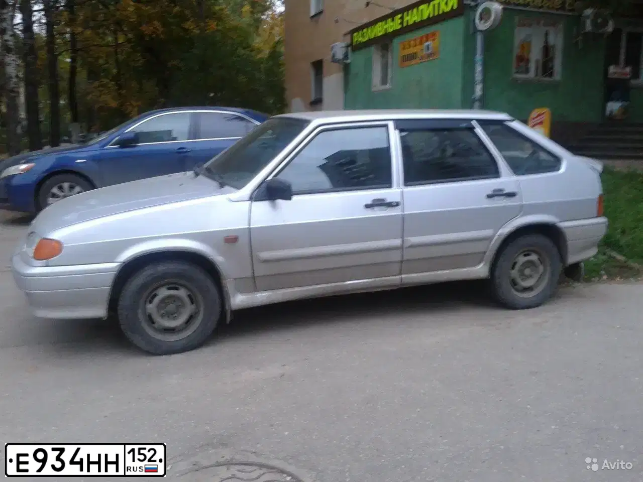 Фото автомобиля LADA 2114 SAMARA, 2011 — госномер Е934НН152. Цвет: СВЕТЛО-СЕРЫЙ
