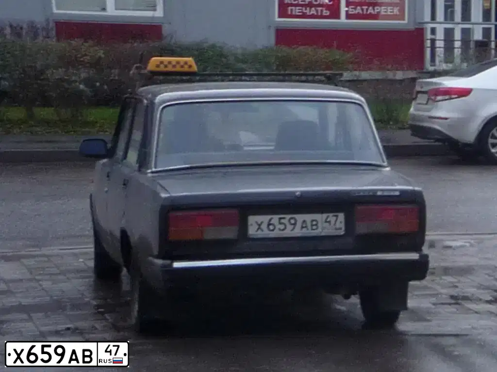 Фото автомобиля LADA 2107, 2012 — госномер Х659АВ47. Цвет: СЕРЕБРИСТО-КОРИЧНЕВЫЙ