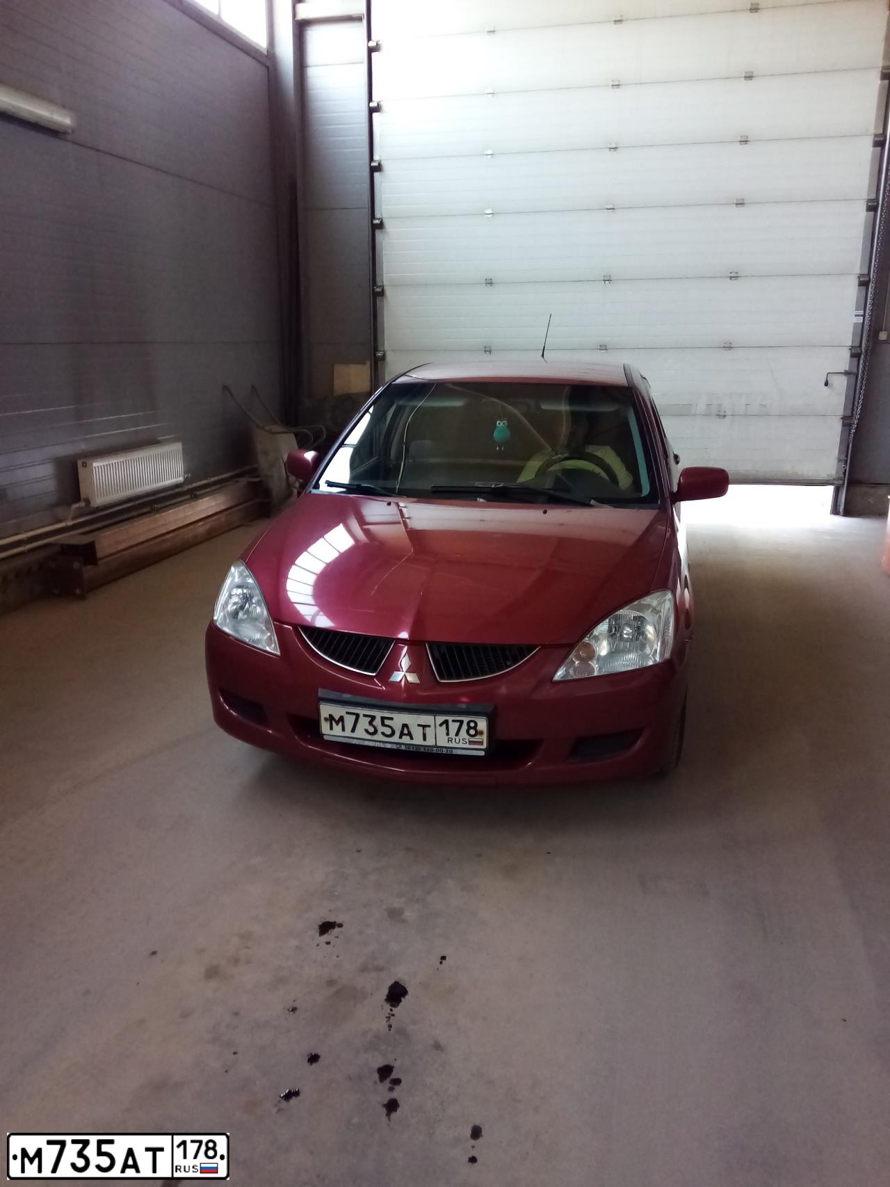 Фото автомобиля MITSUBISHI LANCER, 2004 — госномер Р244ЕО790. Цвет: Красный