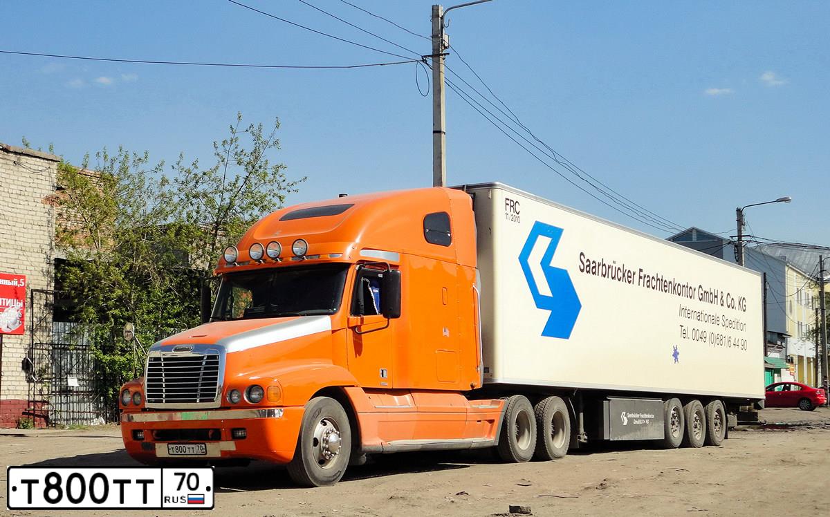 Фото автомобиля FREIGHTLINER CENTURY S/T, 2000 — госномер С851НО70. Цвет: ОРАНЖЕВЫЙ