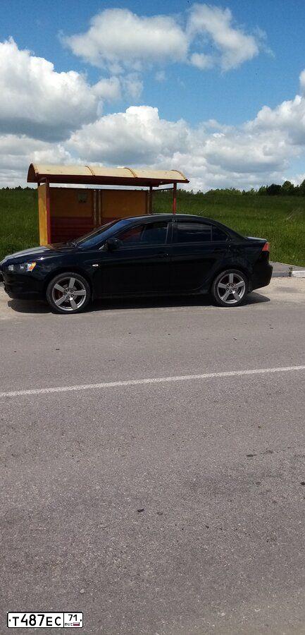 Фото автомобиля MITSUBISHI LANCER, 2008 — госномер Т487ЕС71. Цвет: ЧЕРНЫЙ