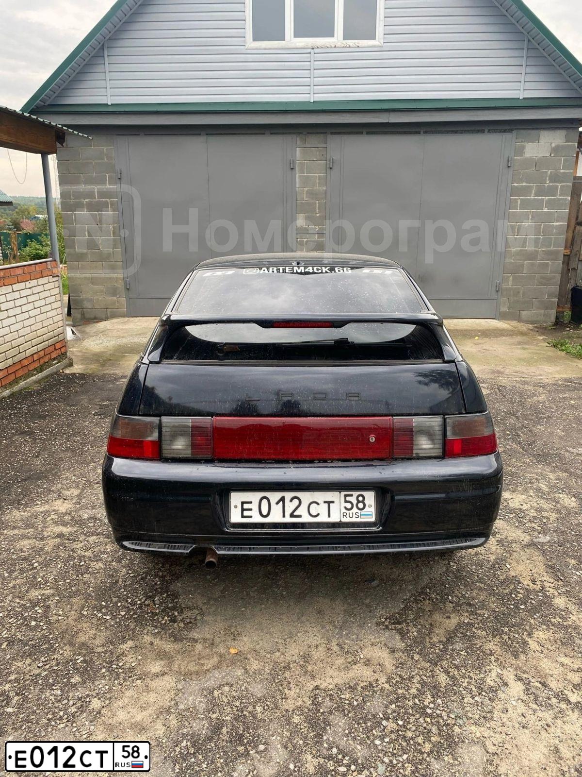 Фото автомобиля LADA 2112 LADA, 2006 — госномер Е012СТ58. Цвет: ГРАФИТОВЫЙ МЕТАЛЛИК