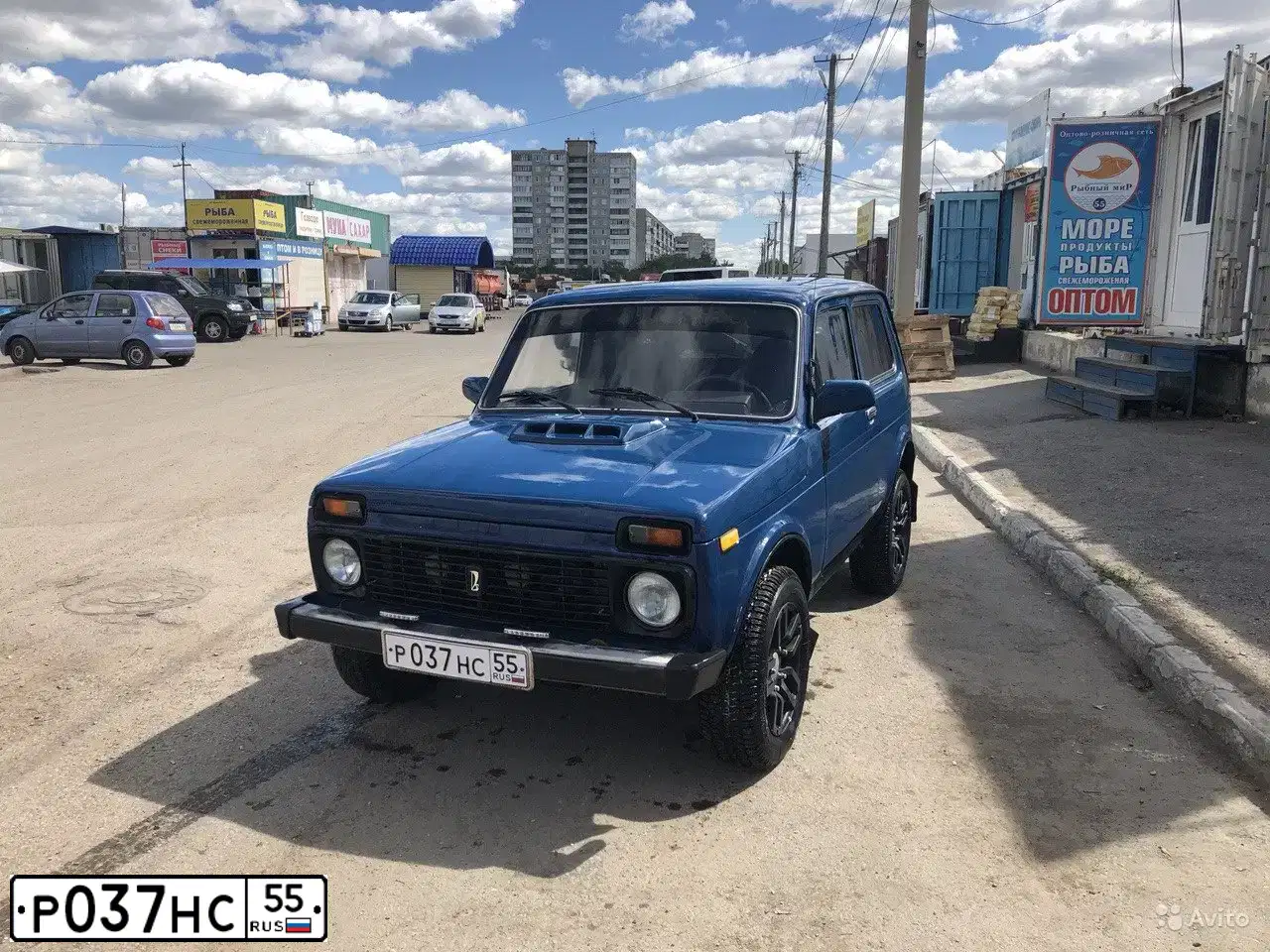 Фото автомобиля LADA 2121 NIVA, 2002 — госномер Р037НС55. Цвет: сине-зеленый