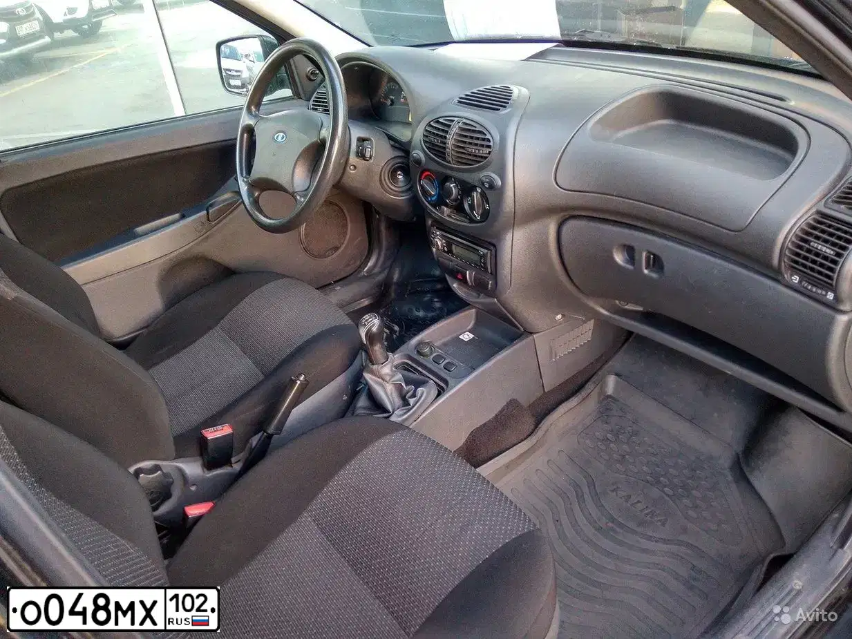 Фото автомобиля LADA 1117 KALINA, 2013 — госномер О048МХ102. Цвет: Сине-Черный