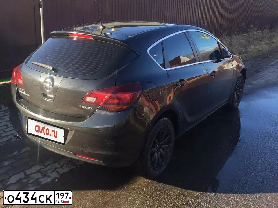 Фото автомобиля OPEL ASTRA, 2012 — госномер О434СК197. Цвет: ЧЕРНЫЙ