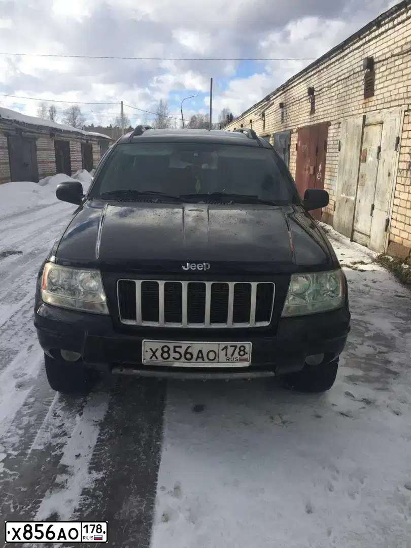 Фото автомобиля JEEP GRAND CHEROKEE, 2003 — госномер О525УМ46. Цвет: ЧЕРНЫЙ