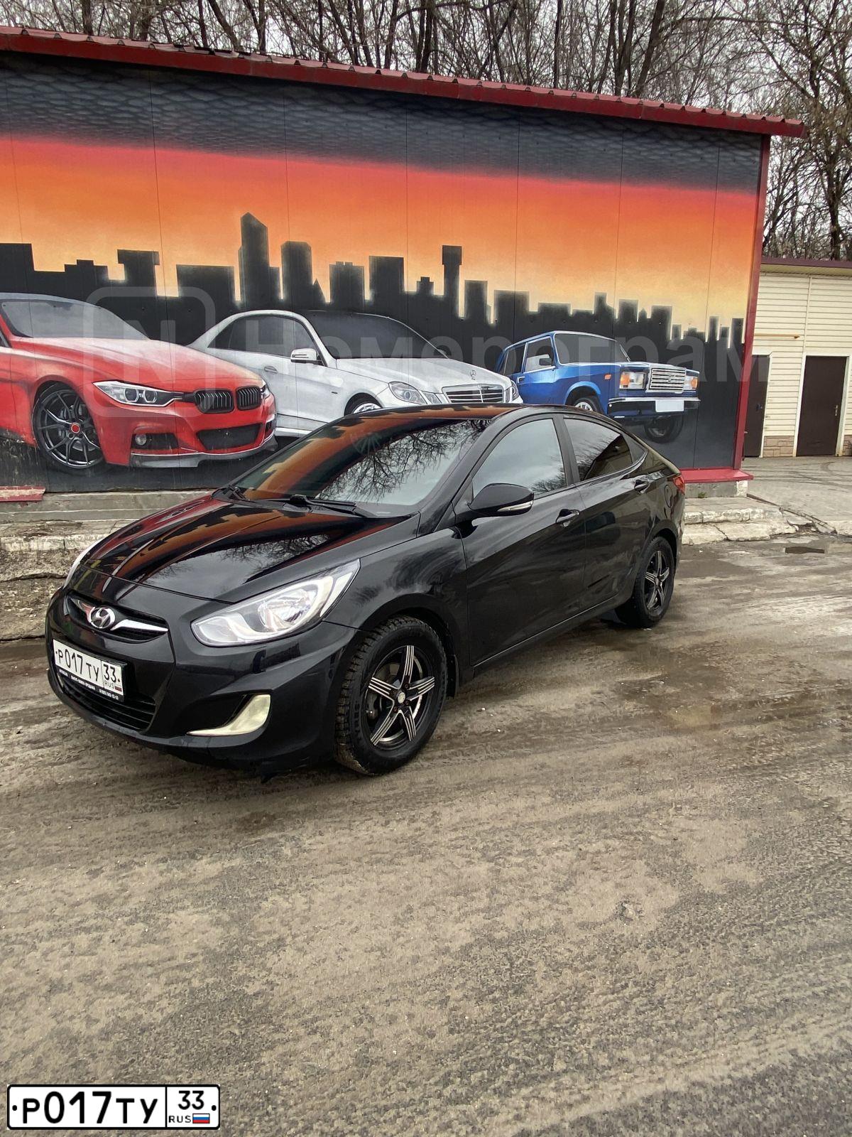 Фото автомобиля HYUNDAI SOLARIS, 2013 — госномер К272АН50. Цвет: ЧЕРНЫЙ