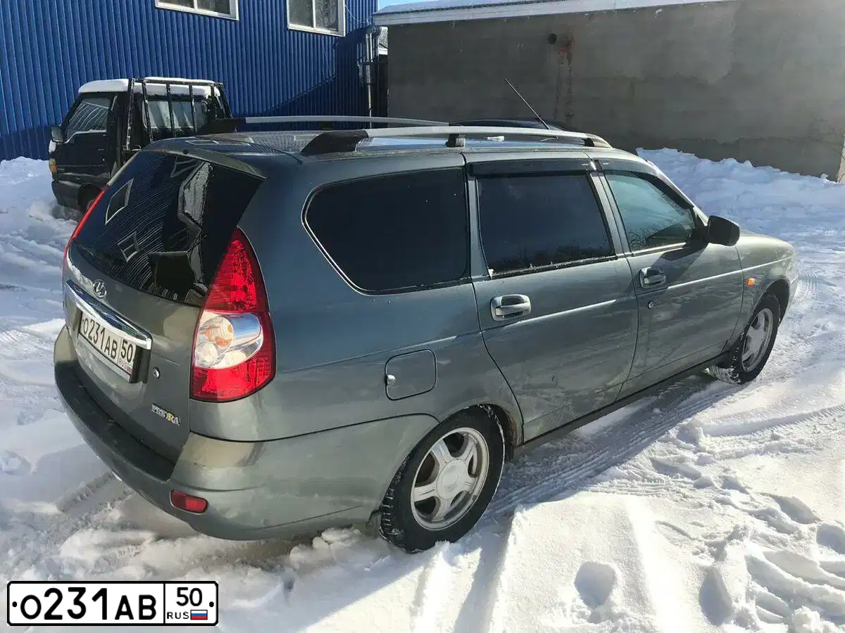 Фото автомобиля LADA 2171 PRIORA, 2011 — госномер К732ТХ161. Цвет: СРЕДНИЙ СЕРО ЗЕЛ МЕТ