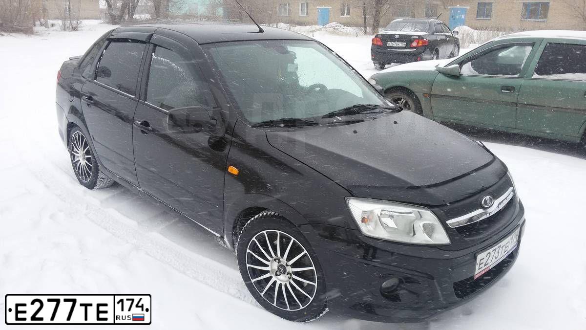 Фото автомобиля KIA RIO, 2017 — госномер Е277ТЕ174. Цвет: Коричневый
