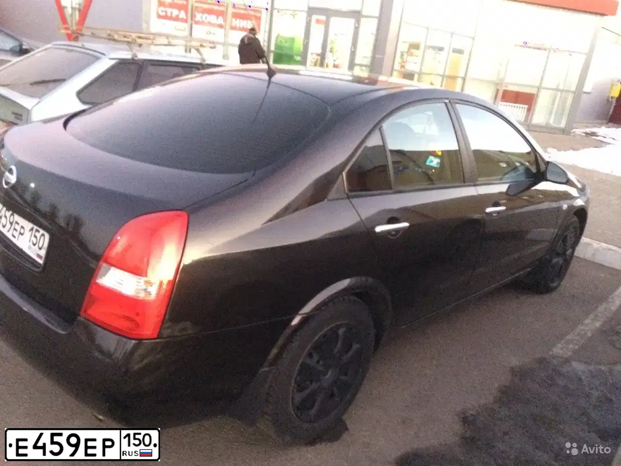 Фото автомобиля NISSAN PRIMERA, 2007 — госномер Т028ТЕ31. Цвет: ЧЕРНЫЙ