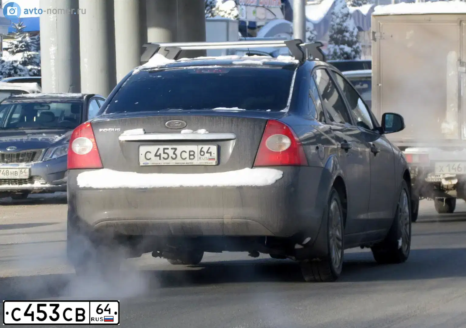 Фото автомобиля FORD FOCUS, 2008 — госномер К716ЕР164. Цвет: ТЕМНО СЕРЫЙ
