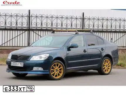 Фото автомобиля MITSUBISHI LANCER, 2008 — госномер Е355ТУ702. Цвет: СЕРЫЙ