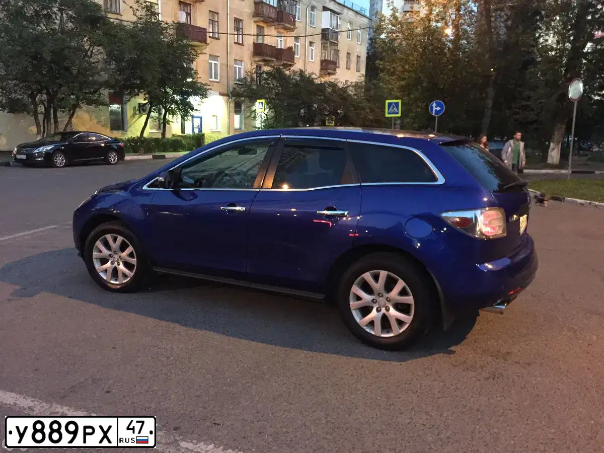 Фото автомобиля MAZDA CX-7, 2007 — госномер У889РХ47. Цвет: СИНИЙ