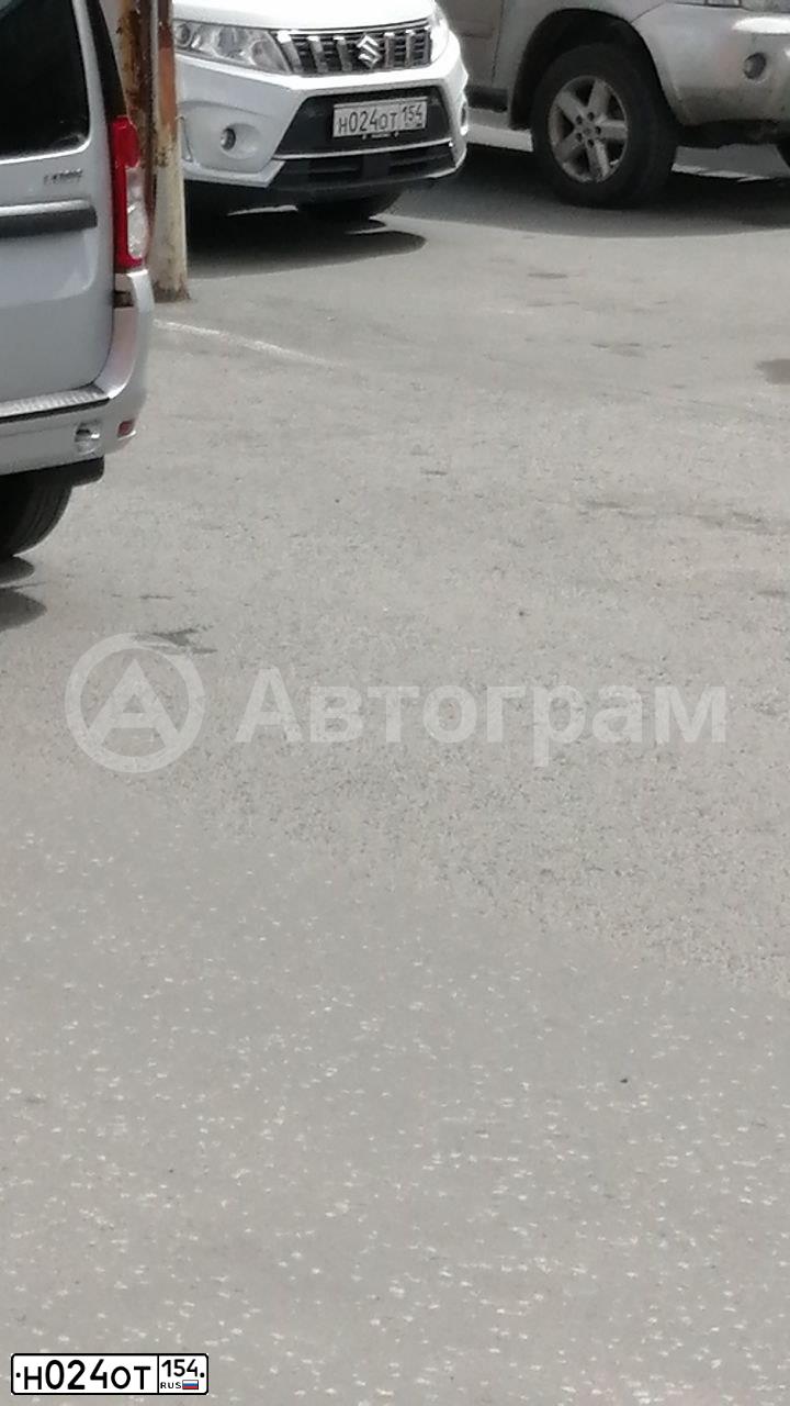 Фото автомобиля SUZUKI GRAND VITARA, 2019 — госномер Н024ОТ154. Цвет: БЕЛЫЙ