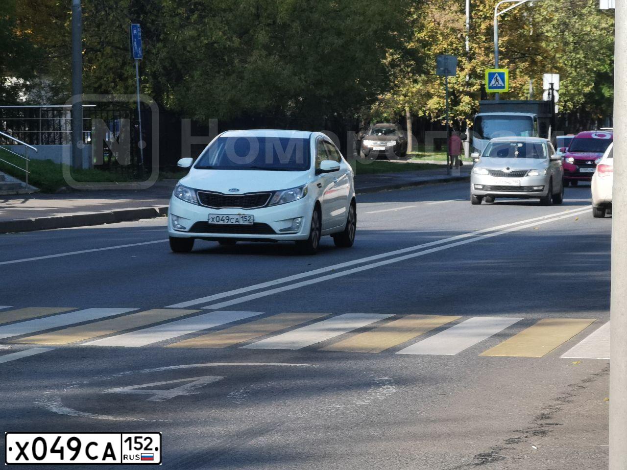 Фото автомобиля KIA RIO, 2014 — госномер Е511СС790. Цвет: Белый