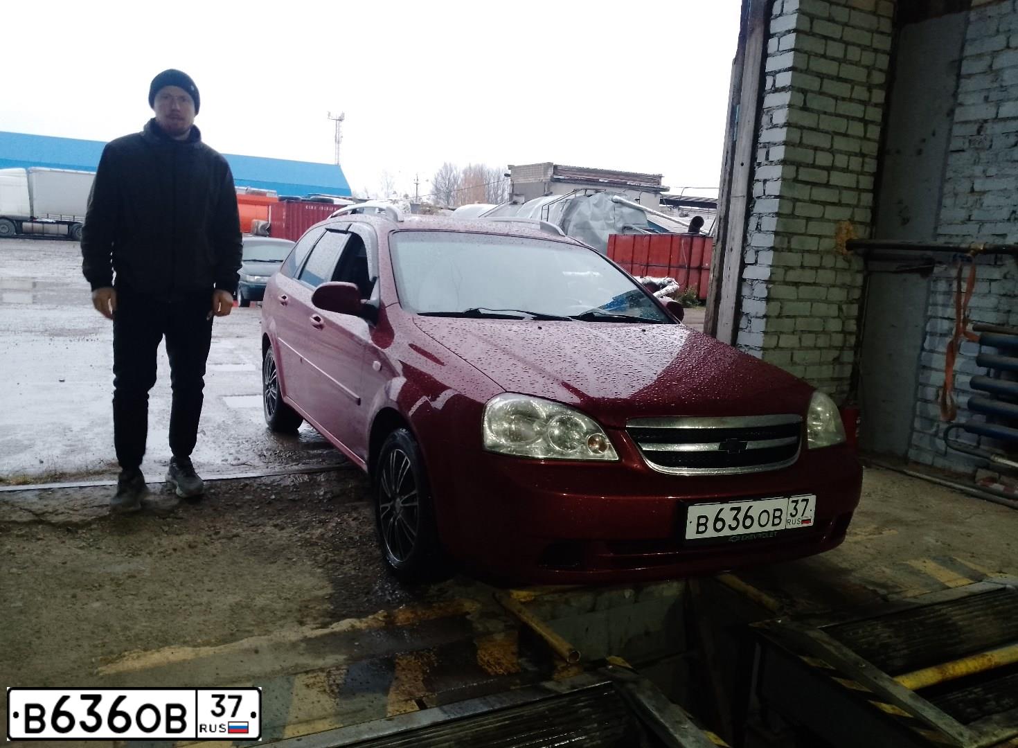 Фото автомобиля CHEVROLET LACETTI, 2008 — госномер К300ЕР199. Цвет: Красный