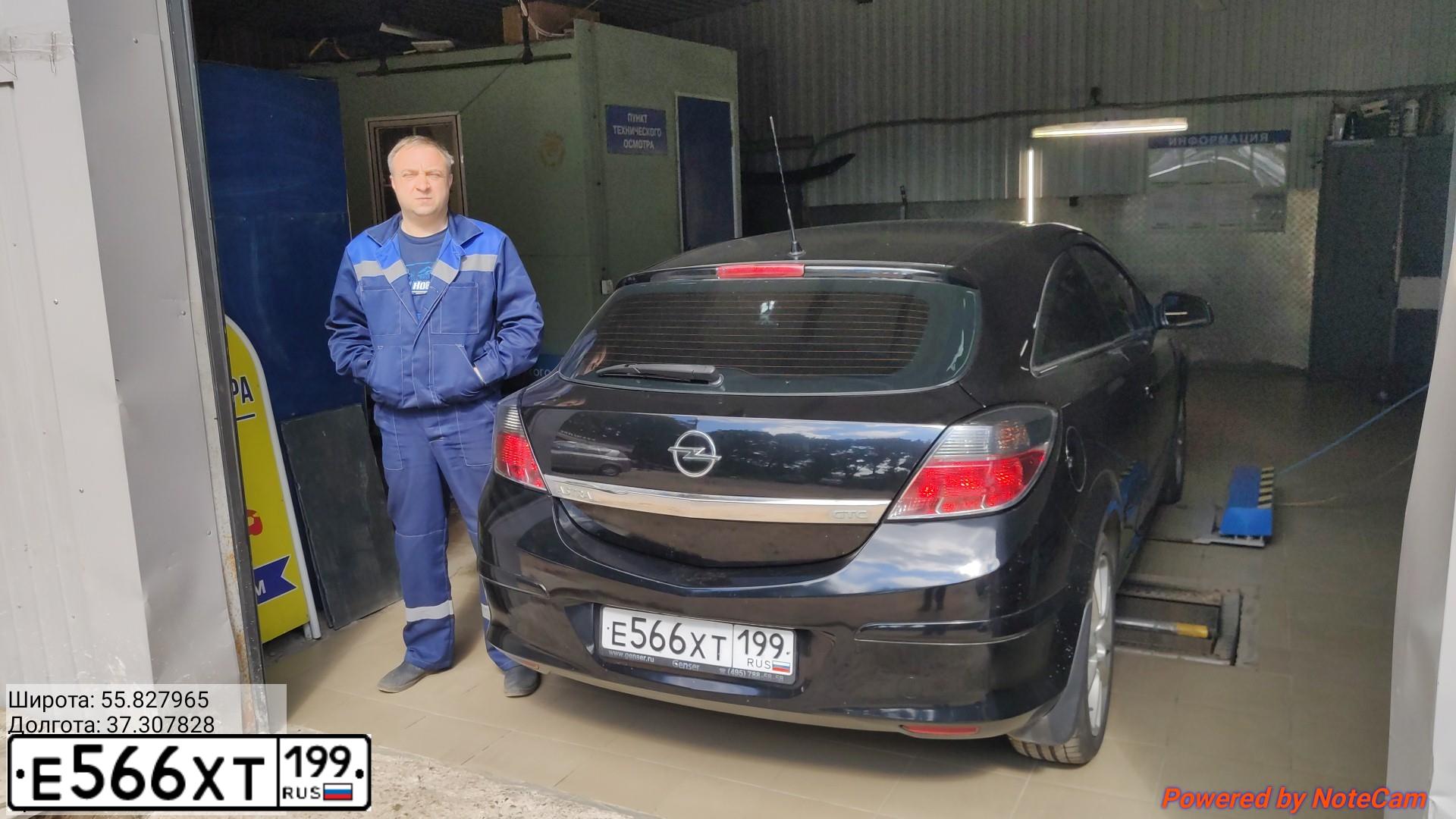 Фото автомобиля OPEL ASTRA, 2010 — госномер Е566ХТ199. Цвет: ЧЕРНЫЙ