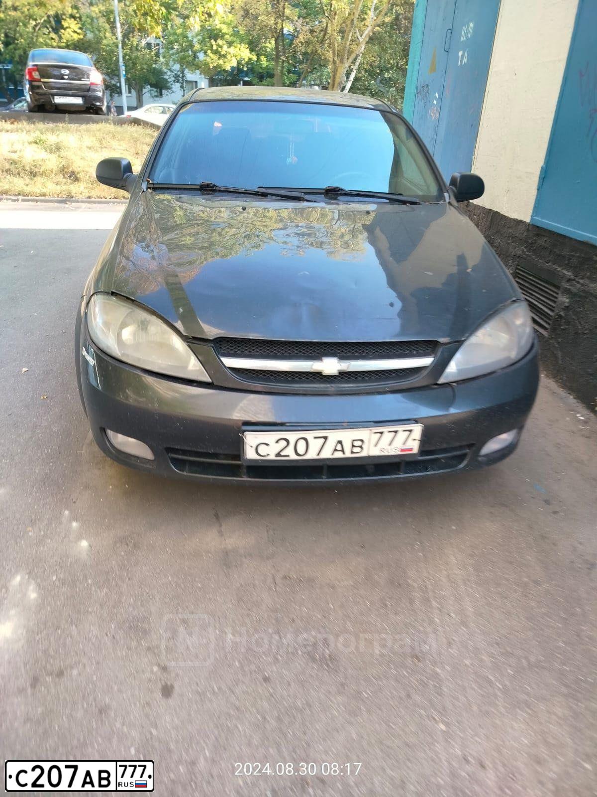 Фото автомобиля CHEVROLET LACETTI, 2008 — госномер С207АВ777. Цвет: ЧЕРНЫЙ