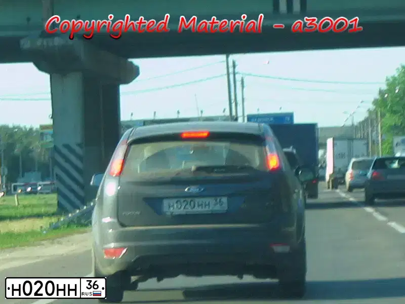 Фото автомобиля FORD FOCUS, 2010 — госномер Н020НН36. Цвет: ТЕМНО-СЕРЫЙ