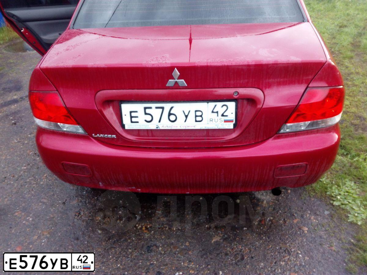 Фото автомобиля MITSUBISHI LANCER, 2003 — госномер А181НТ142. Цвет: Красный