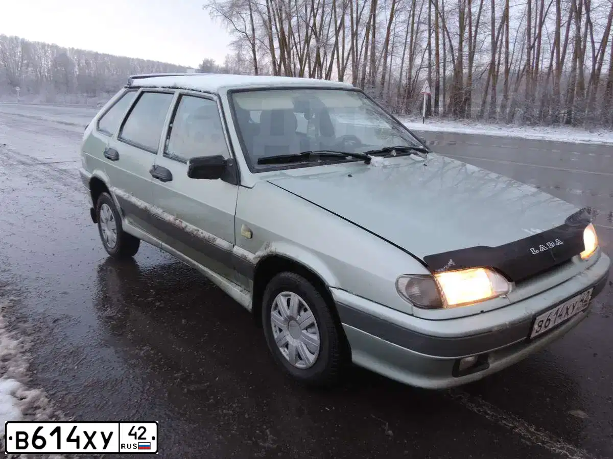 Фото автомобиля LADA 2114 SAMARA, 2006 — госномер В614ХУ42. Цвет: БЕЛО-ЗЕЛЕНЫЙ