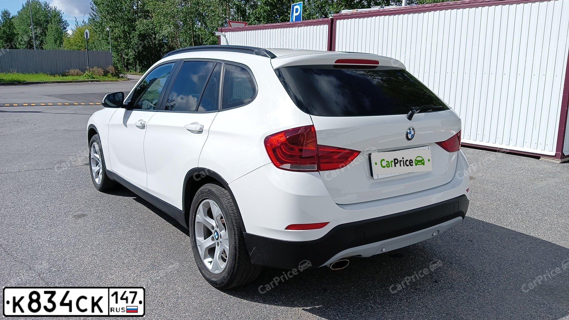 Фото автомобиля BMW X1, 2014 — госномер К834СК147. Цвет: Белый