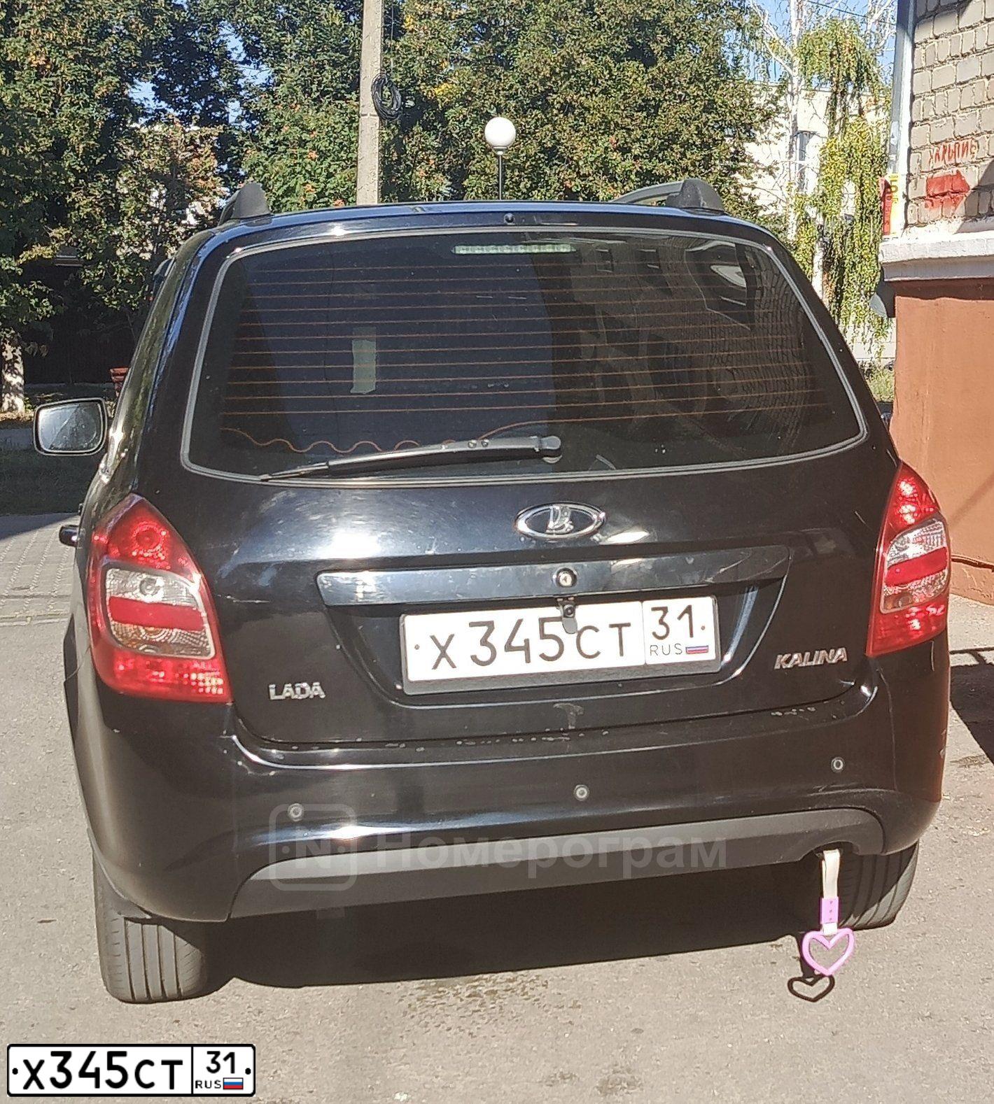 Фото автомобиля LADA 2194 KALINA, 2014 — госномер Х345СТ31. Цвет: Сине-Черный