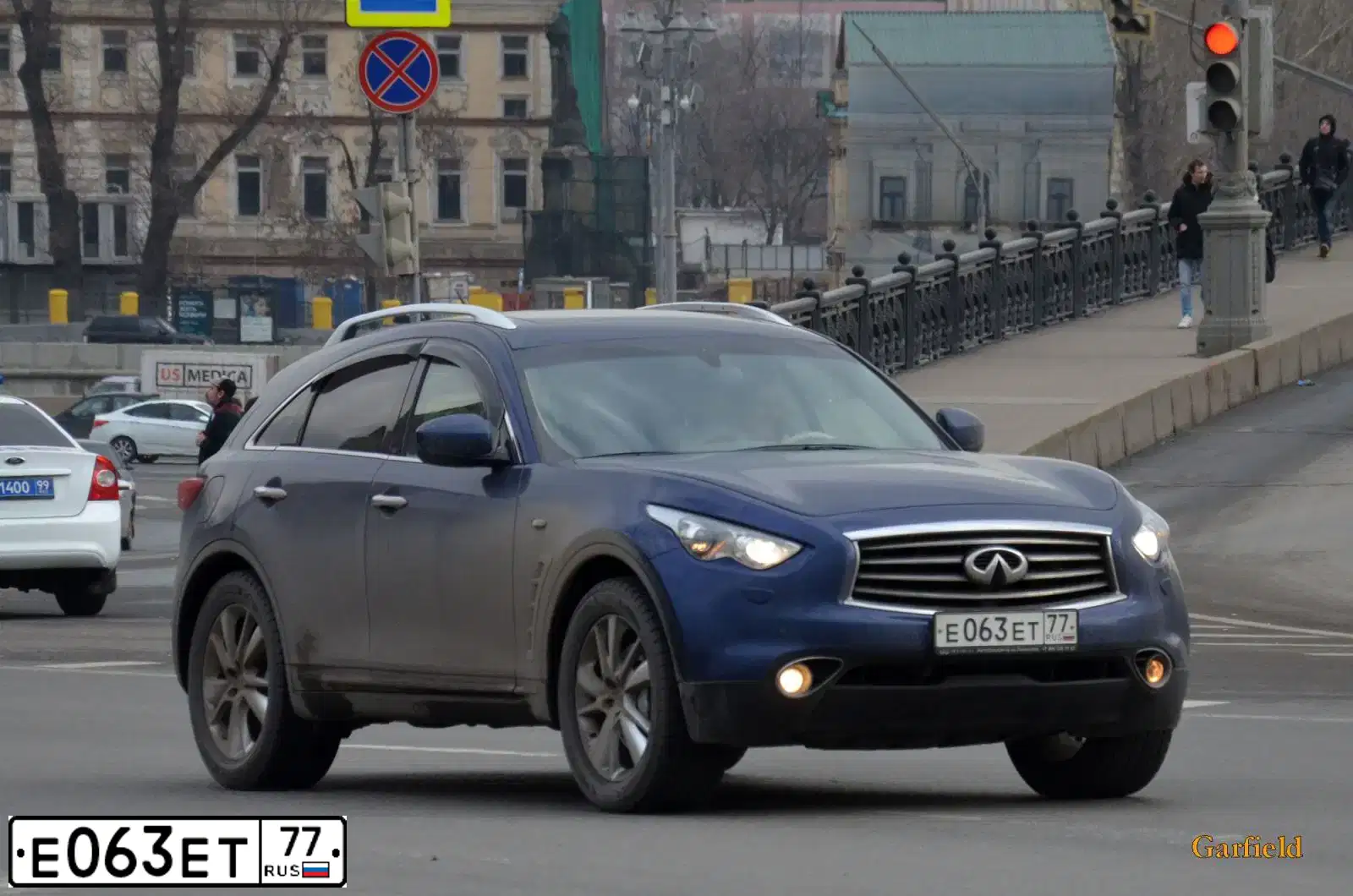 Фото автомобиля INFINITI QX70 /FX/, 2012 — госномер М212СТ790. Цвет: синий