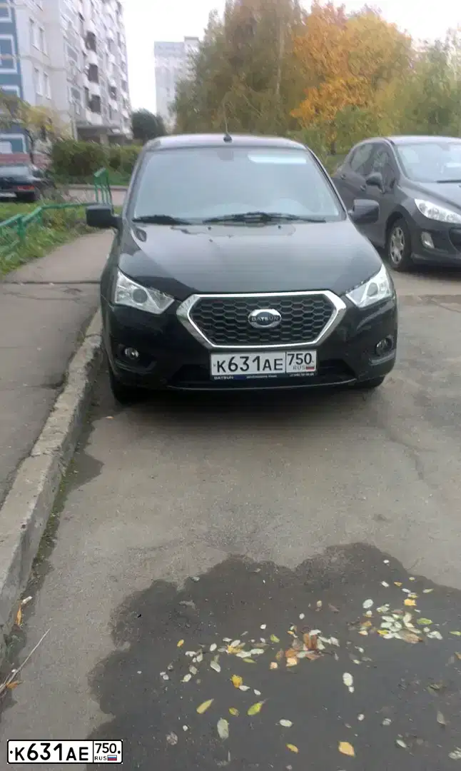Фото автомобиля DATSUN MI-DO, 2015 — госномер Р158ЕВ126. Цвет: ЧЕРНЫЙ
