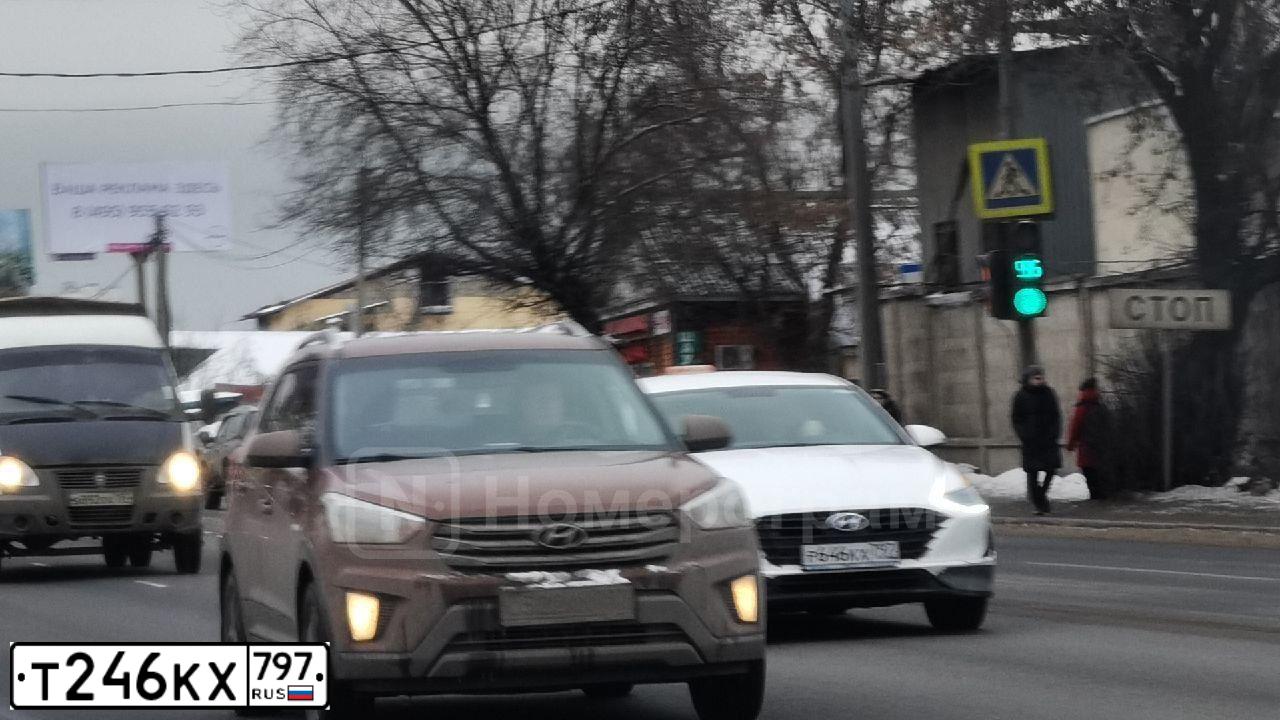 Фото автомобиля VOLKSWAGEN AMAROK, 2012 — госномер Т246КХ797. Цвет: ЧЕРНЫЙ