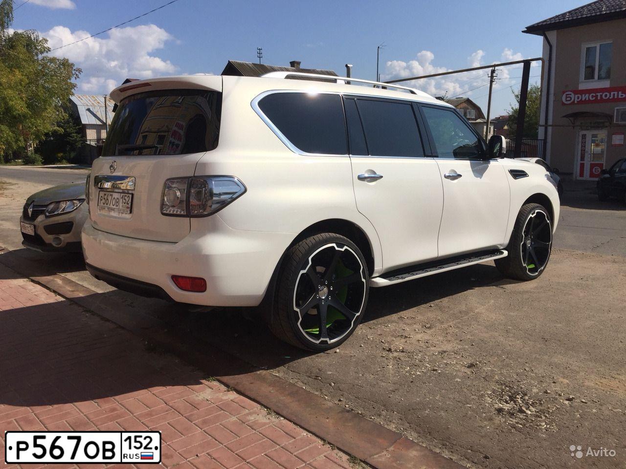 Фото автомобиля NISSAN PATROL, 2010 — госномер Р567ОВ152. Цвет: Белый