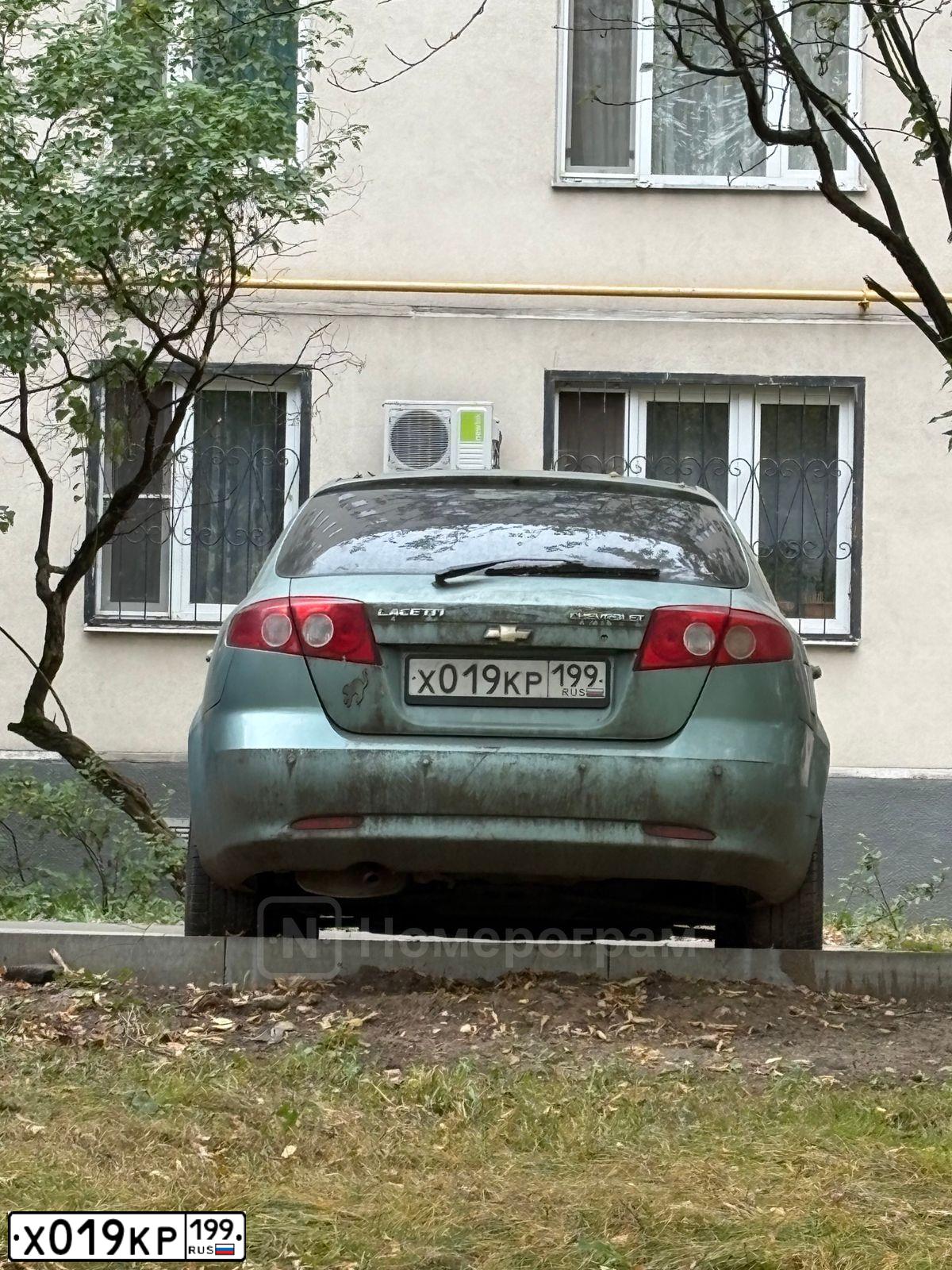 Фото автомобиля CHEVROLET LACETTI, 2007 — госномер Х019КР199. Цвет: ЗЕЛЕНЫЙ