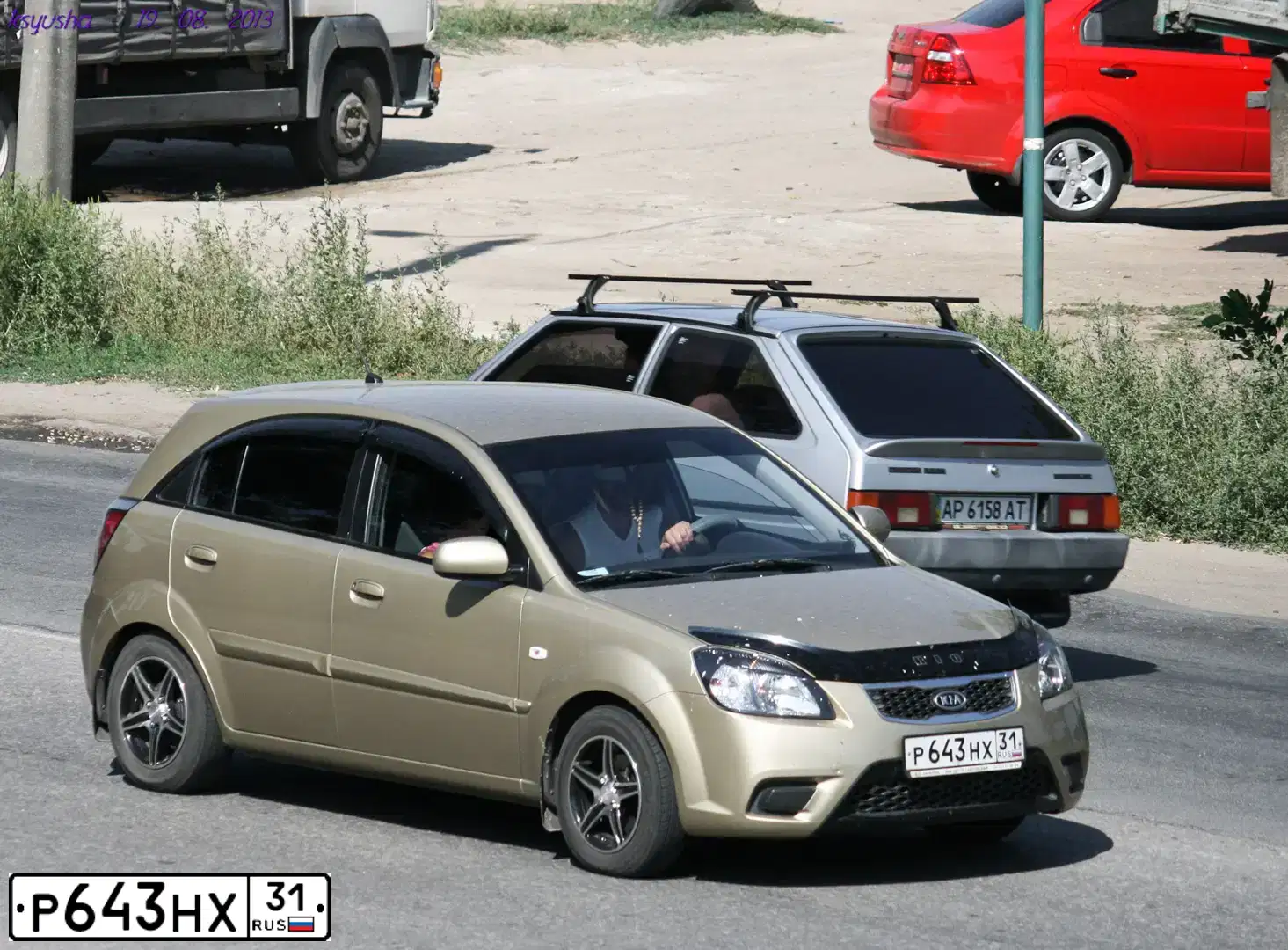Фото автомобиля KIA RIO, 2011 — госномер Р643НХ31. Цвет: БЕЖЕВЫЙ