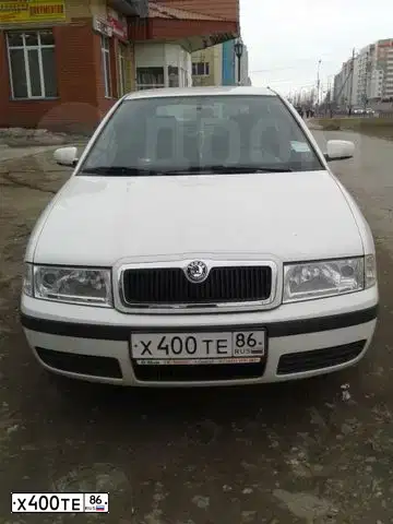 Фото автомобиля SKODA OCTAVIA, 2008 — госномер К783АХ186. Цвет: Белый