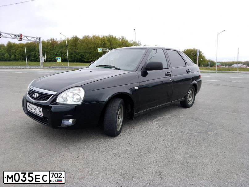 Фото автомобиля LADA 2172 PRIORA, 2010 — госномер Е414ХТ702. Цвет: Сине-Черный