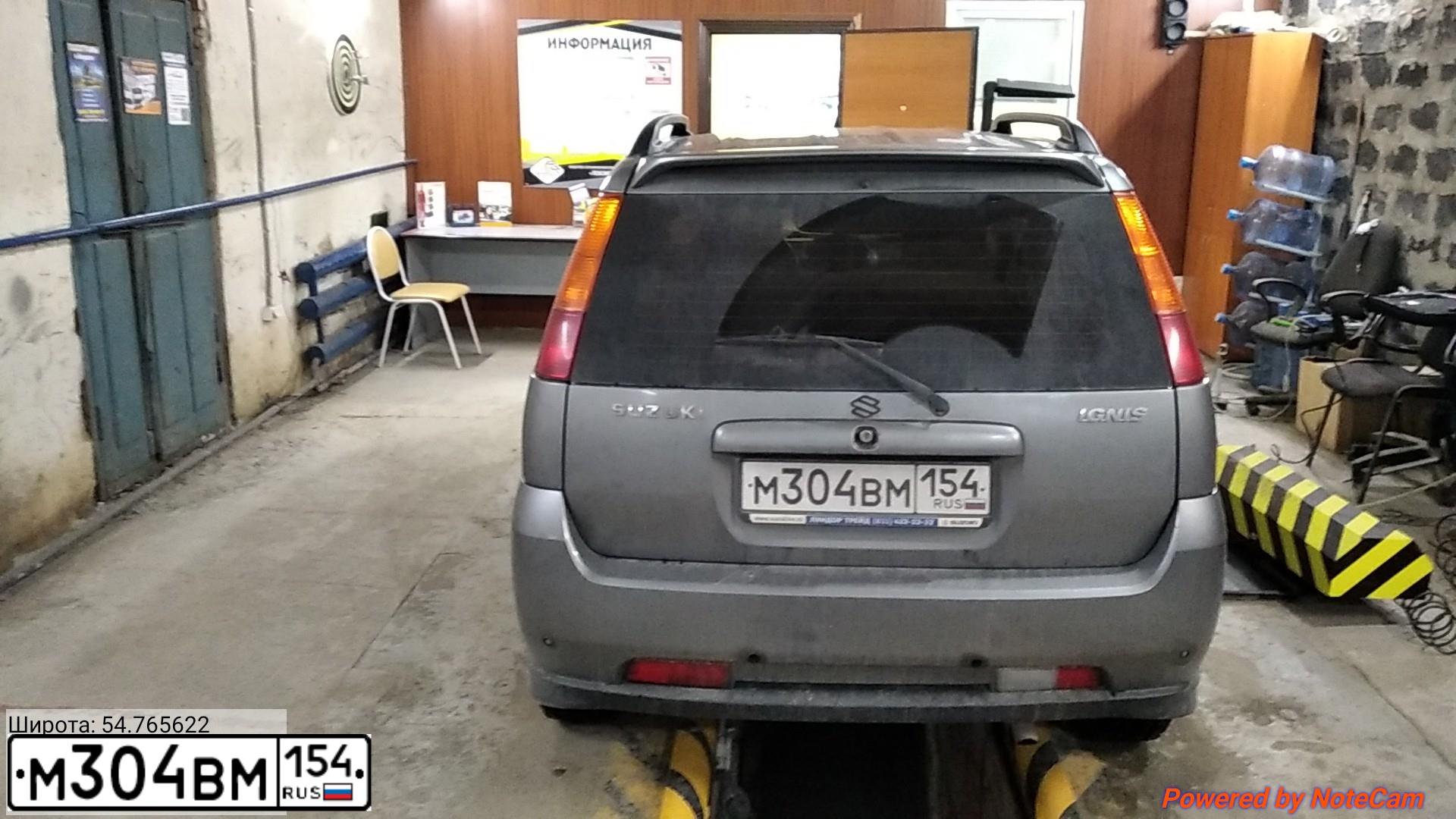 Фото автомобиля SUZUKI IGNIS, 2007 — госномер М304ВМ154. Цвет: СЕРЫЙ