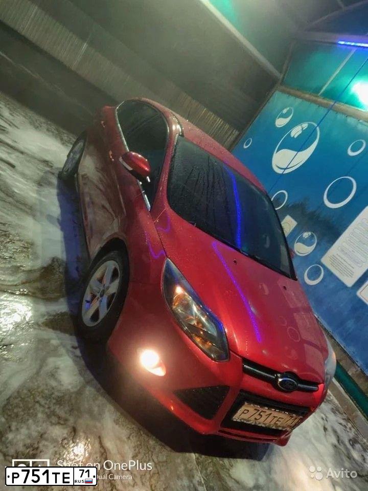 Фото автомобиля FORD FOCUS, 2012 — госномер Р751ТЕ71. Цвет: Красный