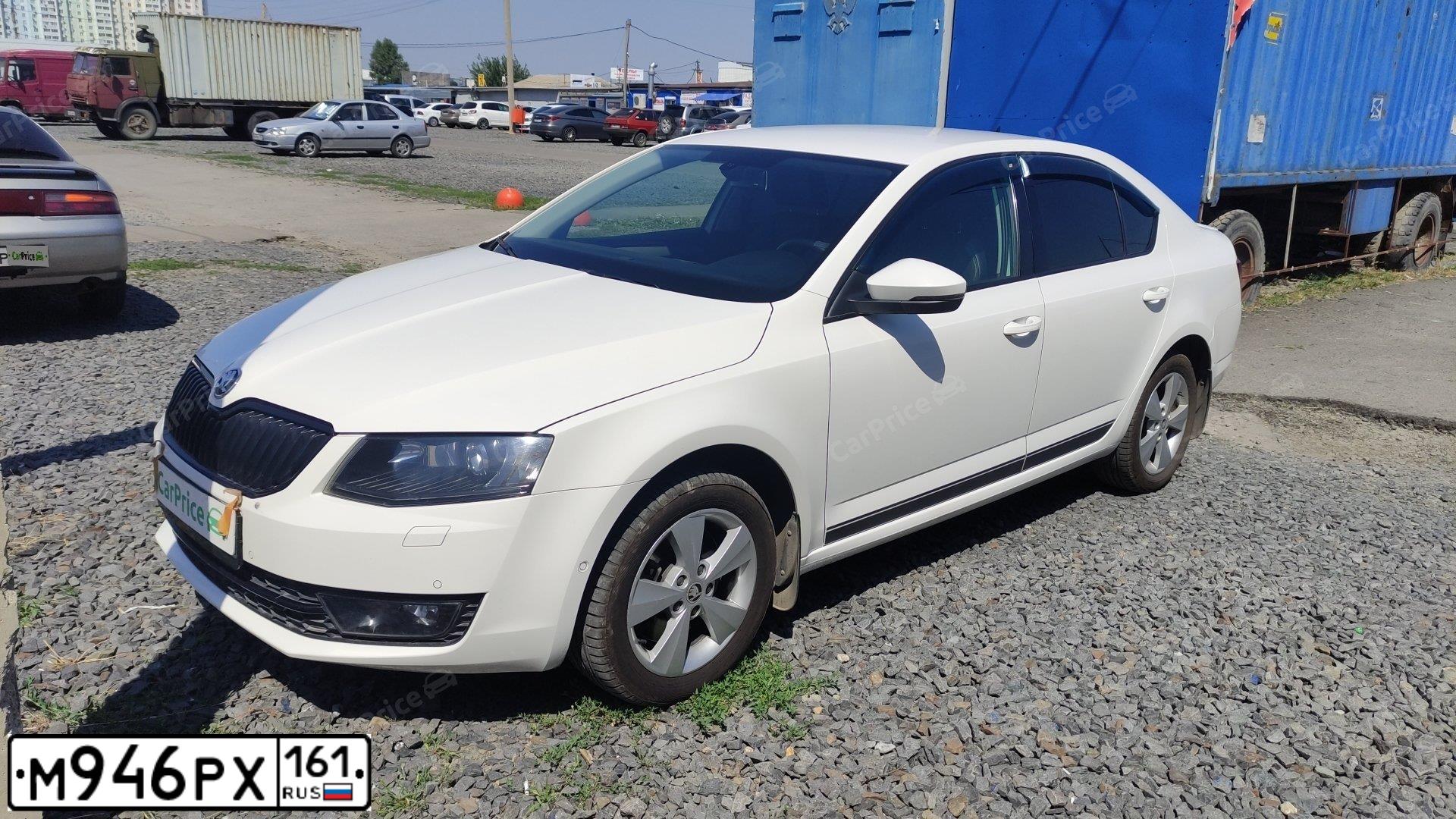 Фото автомобиля SKODA OCTAVIA, 2013 — госномер М946РХ161. Цвет: Белый