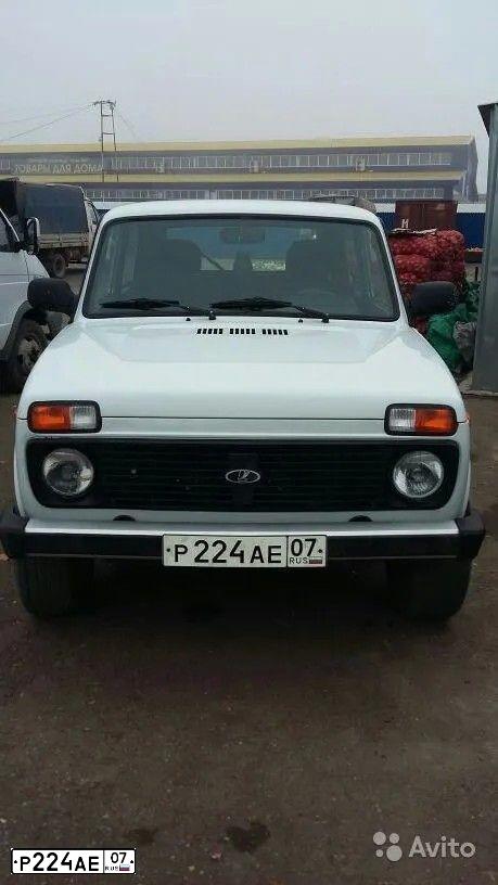Фото автомобиля ВАЗ 21213, 1998 — госномер Е958НТ761. Цвет: БЕЛЫЙ