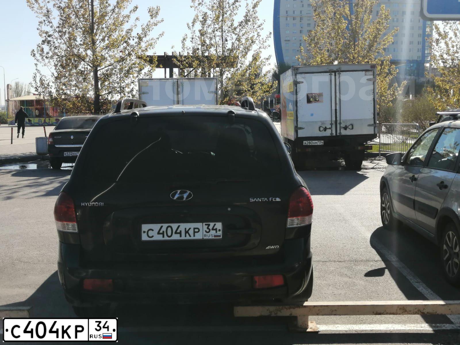 Фото автомобиля HYUNDAI SANTA FE, 2008 — госномер С404КР34. Цвет: Белый