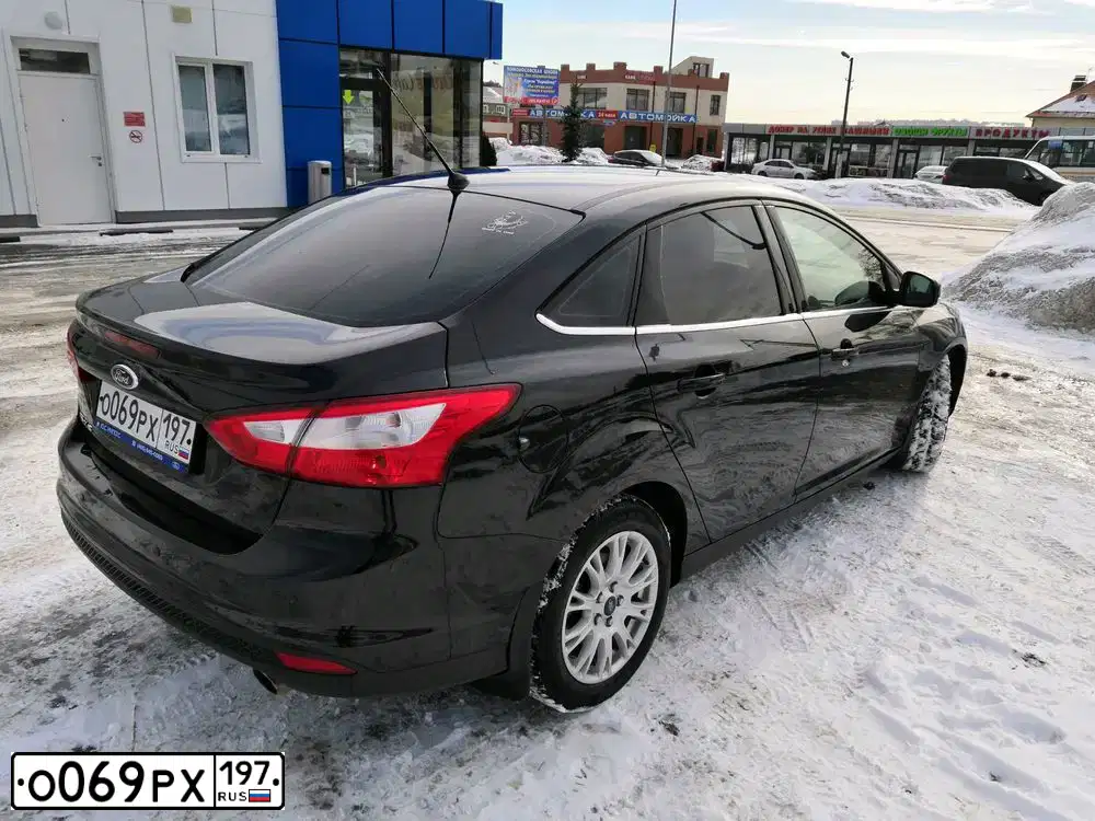 Фото автомобиля FORD FOCUS, 2011 — госномер К092УО95. Цвет: ЧЕРНЫЙ