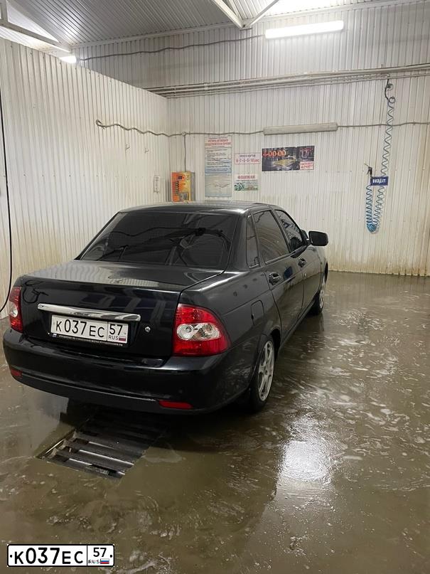 Фото автомобиля LADA 2170 PRIORA, 2010 — госномер К037ЕС57. Цвет: Темно-зеленый