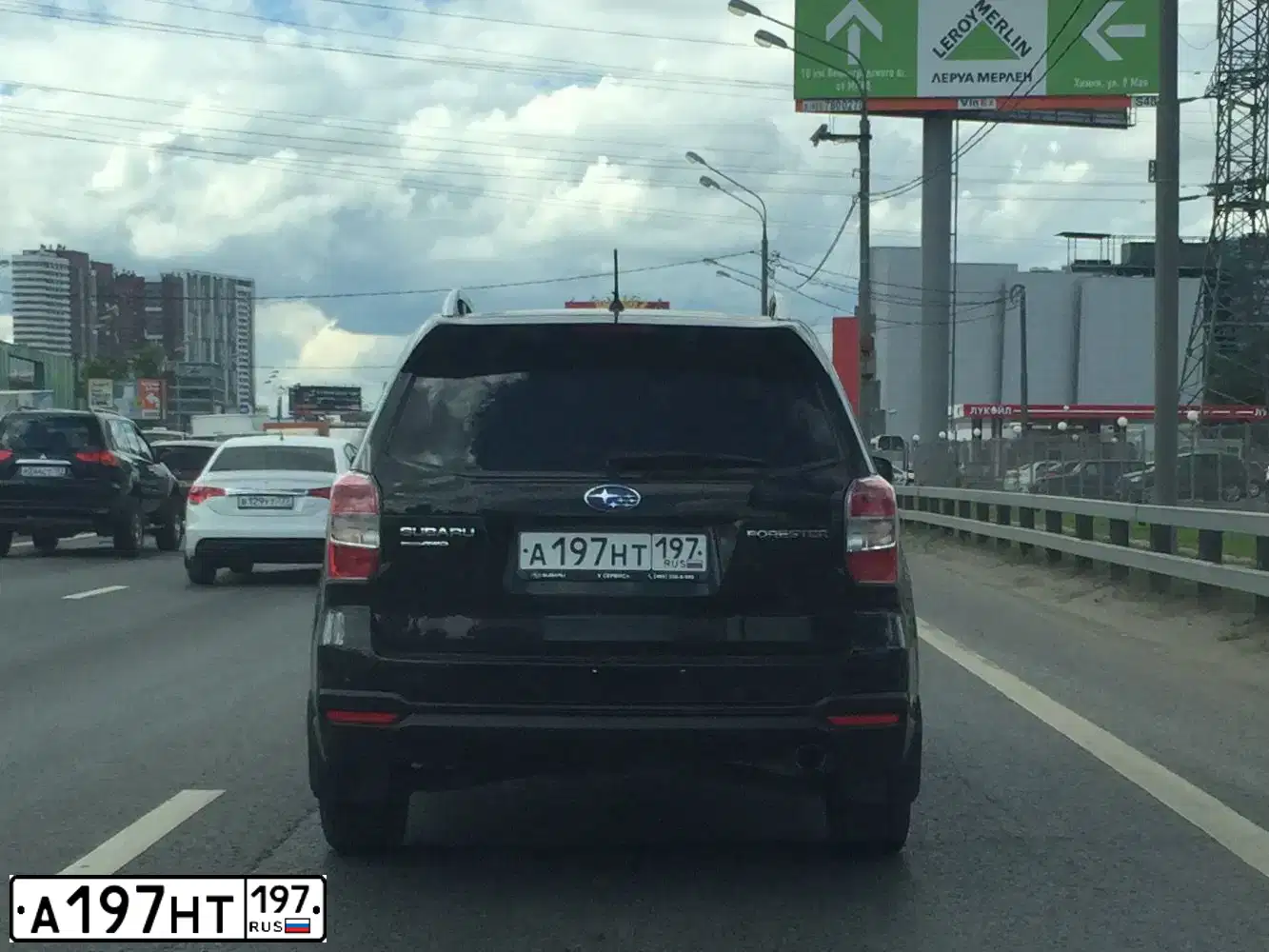 Фото автомобиля SUBARU FORESTER, 2014 — госномер А197НТ197. Цвет: ЧЕРНЫЙ