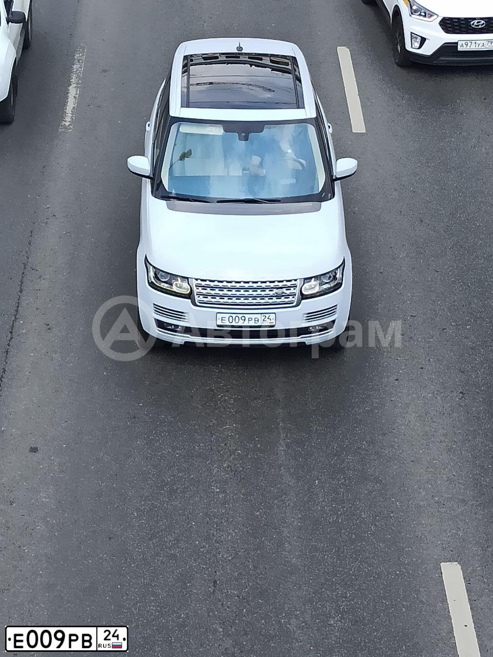 Фото автомобиля LANDROVER RANGE ROVER SPORT, 2008 — госномер Е009РВ24. Цвет: СЕРО-ЗЕЛЕНЫЙ