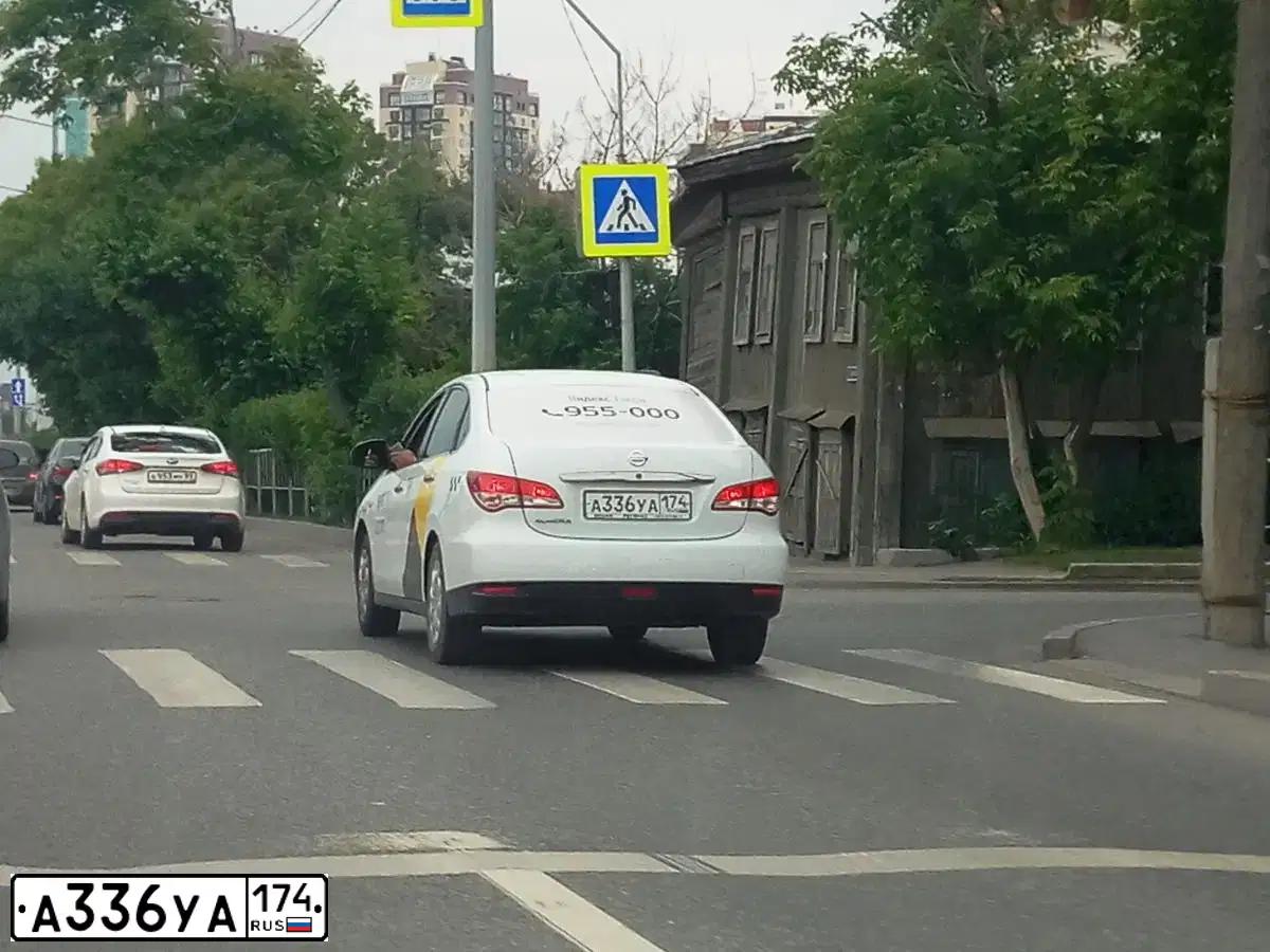 Фото автомобиля NISSAN ALMERA /AVTOVAZ/, 2014 — госномер А336УА174. Цвет: Белый