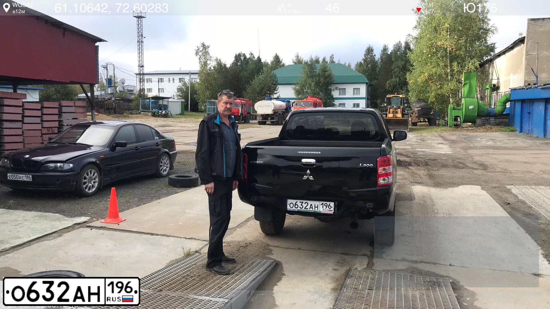 Фото автомобиля MITSUBISHI L200, 2018 — госномер С735АЕ40. Цвет: ЧЕРНЫЙ