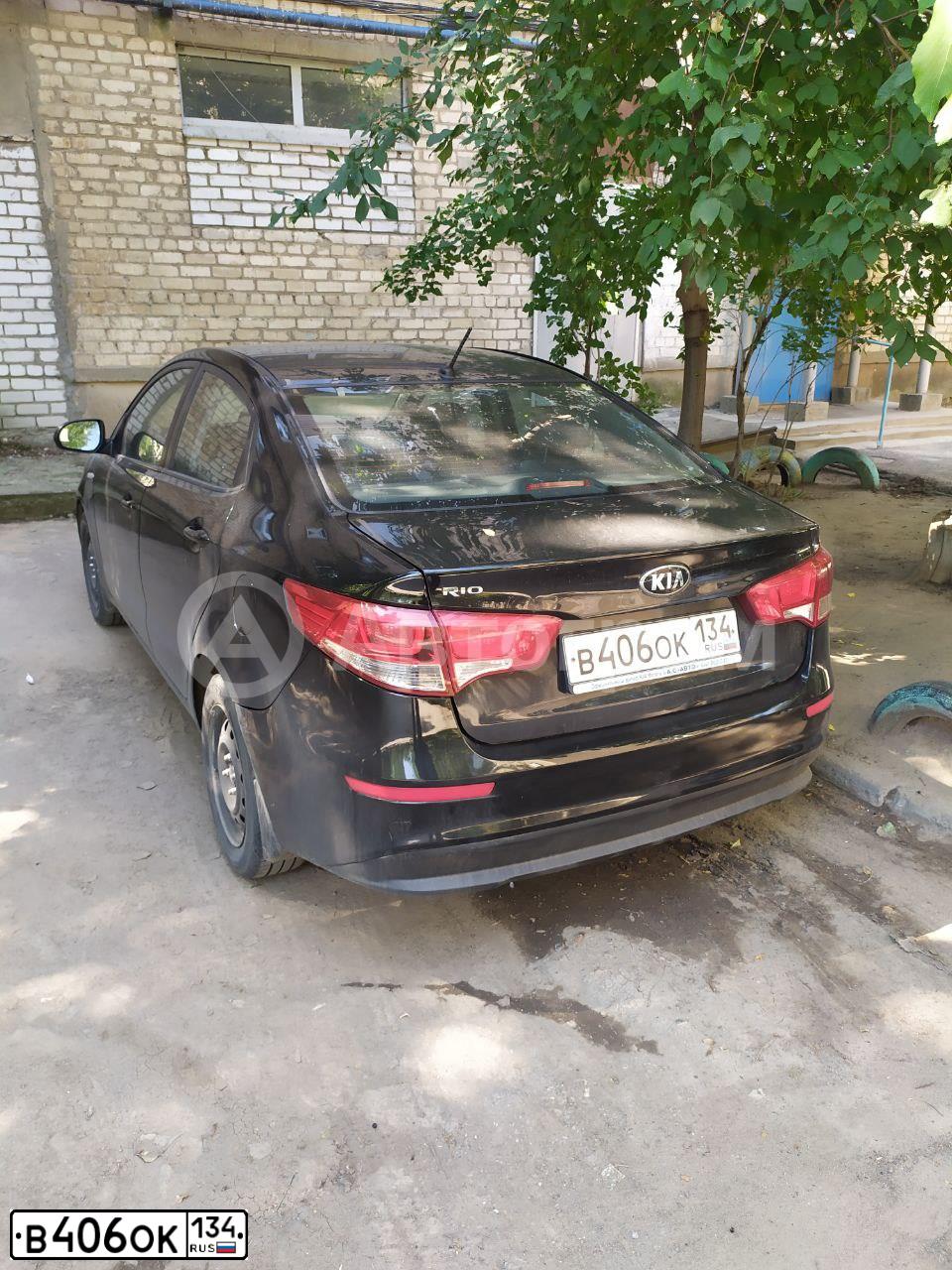 Фото автомобиля KIA RIO, 2015 — госномер В406ОК134. Цвет: ЧЕРНЫЙ