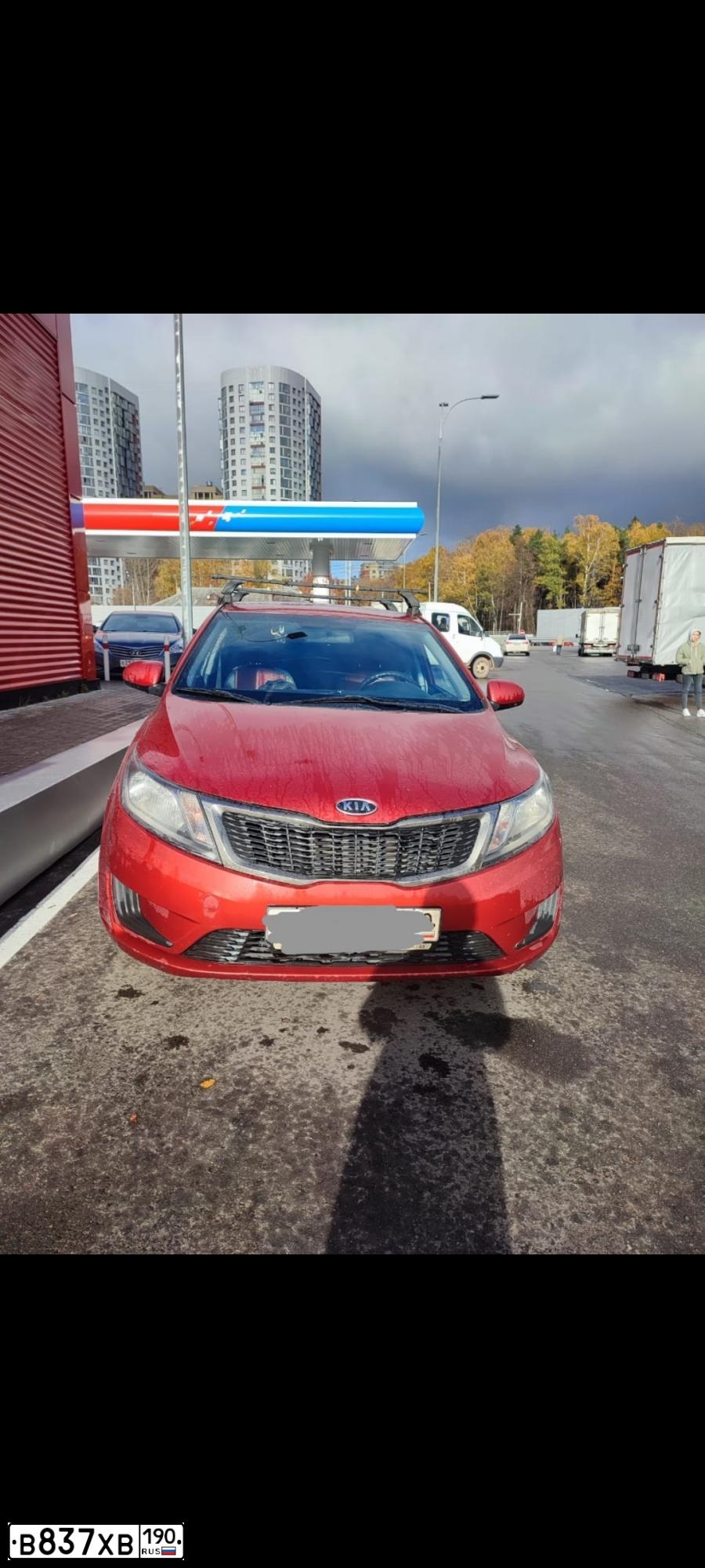 Фото автомобиля KIA RIO, 2012 — госномер Т426РН152. Цвет: КРАСНЫЙ